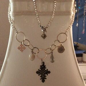 Chic Multi-Charm Necklace with Silver and Gold Details